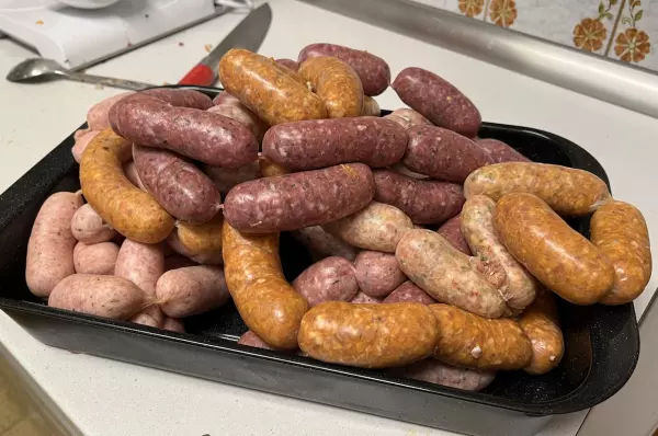 a bowl full of fresh sausages